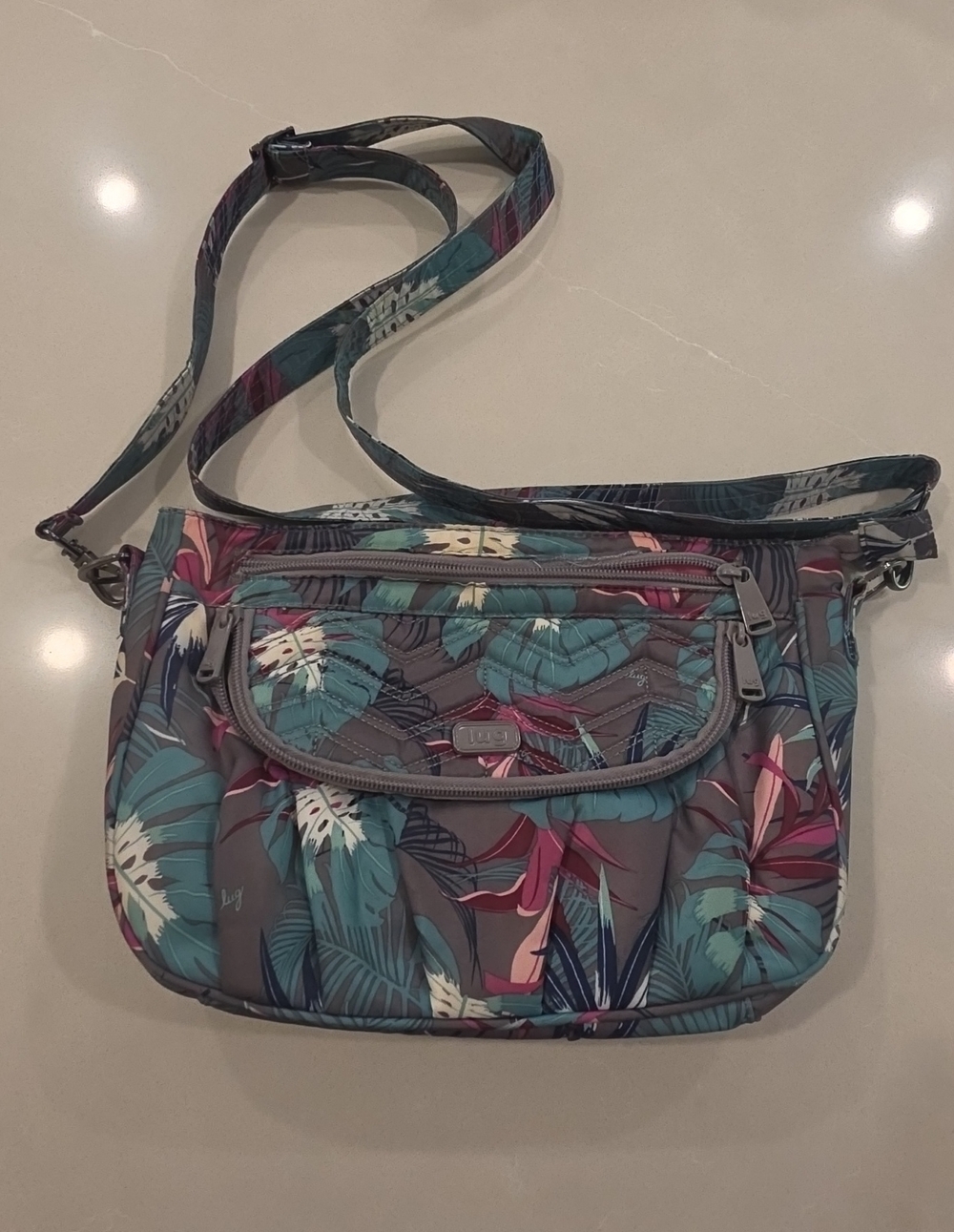 lug Tropical Leaf Quilted Crossbody in Teal, Pink & Gray